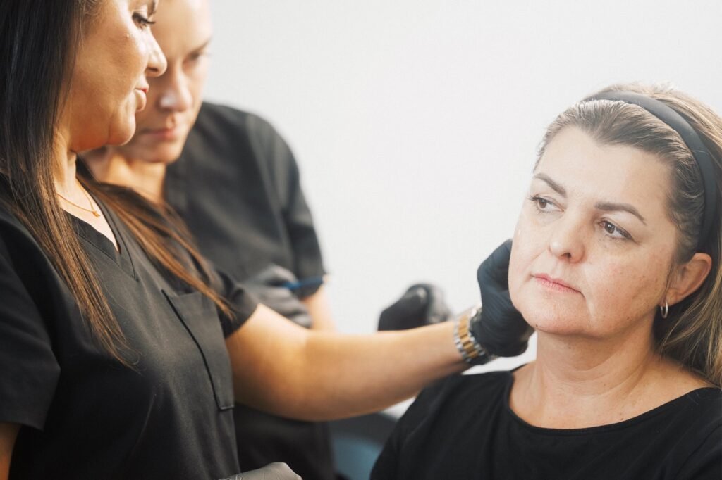Dr Lauren teaching facial anatomy to a group of students at the Aesthetic Training Academy.