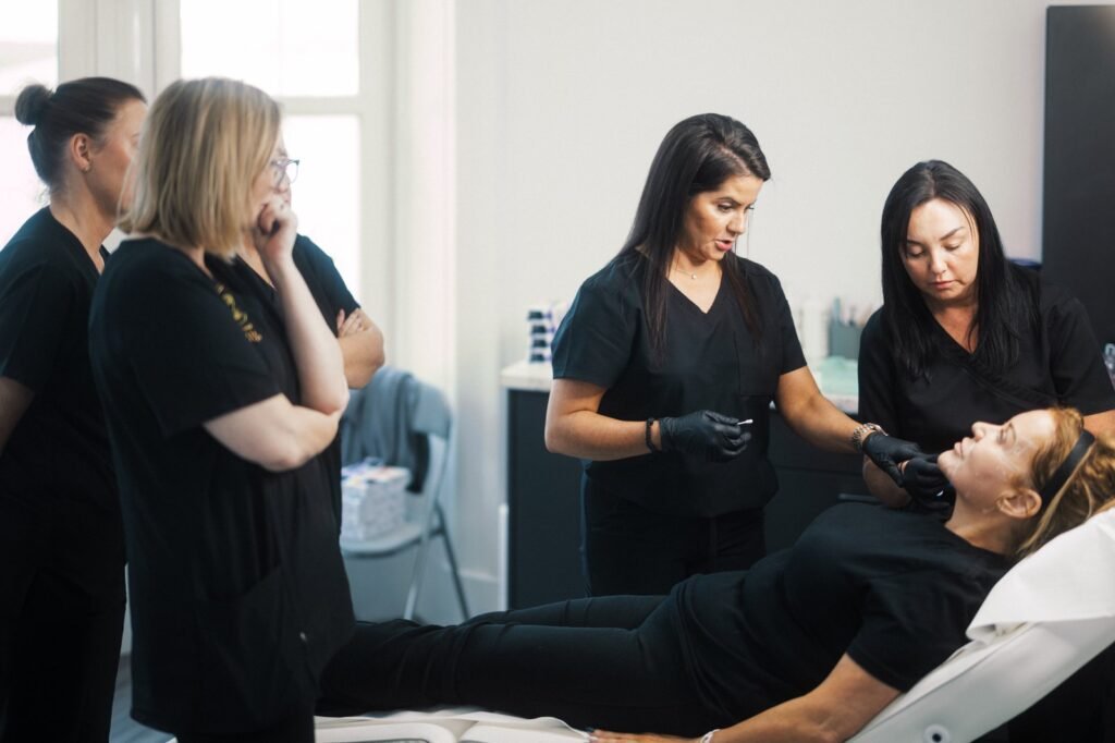 Dr Lauren training her students at the ATA about facial anatomy and where to inject fillers.