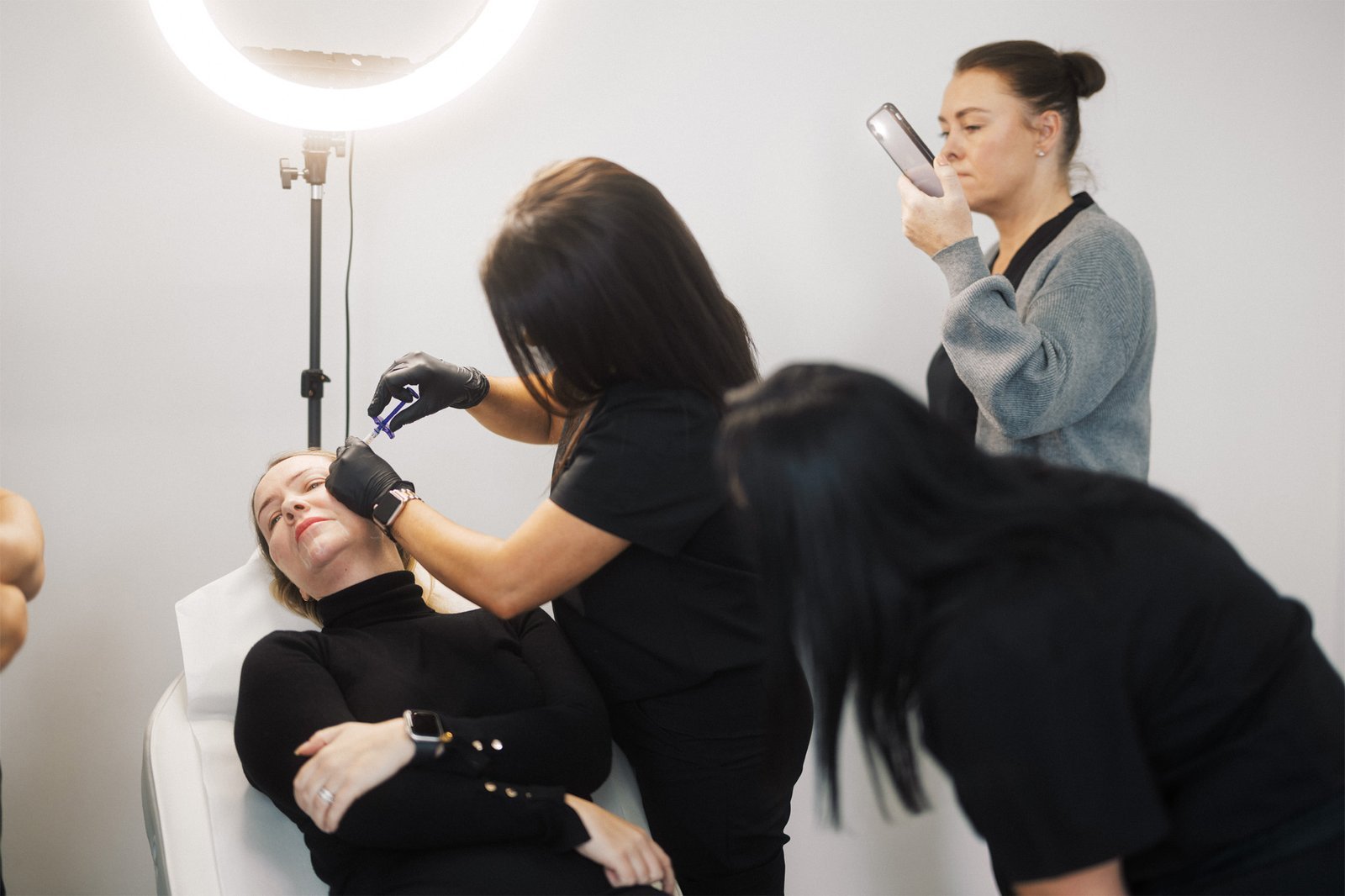 Dr Lauren teaching her students at the ATA how to inject dermal fillers.