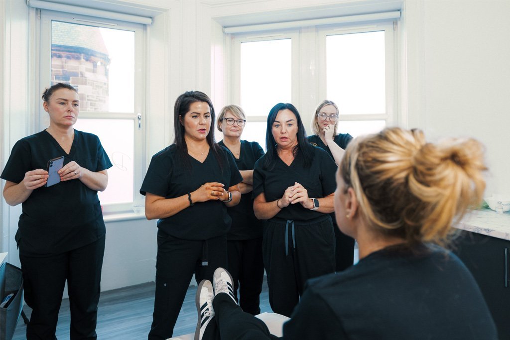 Dr Lauren teaching her students about the facial anatomy.
