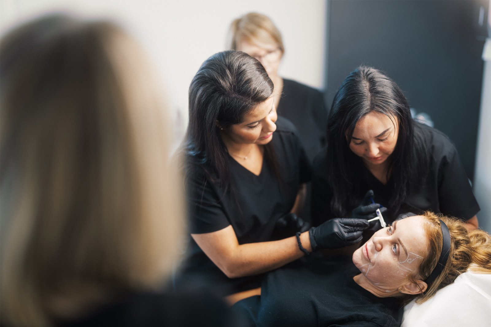 Dr Lauren teaching her students the facial skin structure at the ATA.